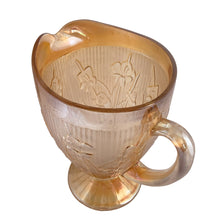 Load image into Gallery viewer, Close-up of 1960s Jeannette Iris pitcher showing iridescent carnival glass and floral pattern