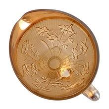 Load image into Gallery viewer, Top view of Jeannette Iris carnival glass pitcher showing pressed floral relief detail