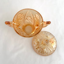 Load image into Gallery viewer, Vintage Iris iridescent flora gold glass creamer and lidded sugar. Crafted by Jeannette Glass, USA, 1960s. The beautifully detailed glassware makes a lovely addition to any tablescape!
In excellent condition, no chips.
Creamer measures 3 1/2 x 3 (not including spout/handle)
Sugar measures 3 3/4 x 5 1/2 inches (not including handles)
