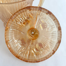 Load image into Gallery viewer, Vintage Iris iridescent flora gold glass creamer and lidded sugar. Crafted by Jeannette Glass, USA, 1960s. The beautifully detailed glassware makes a lovely addition to any tablescape!
In excellent condition, no chips.
Creamer measures 3 1/2 x 3 (not including spout/handle)
Sugar measures 3 3/4 x 5 1/2 inches (not including handles)