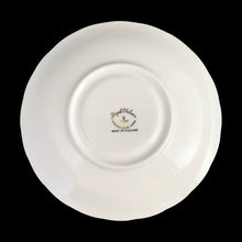 Load image into Gallery viewer, A gorgeous white bone china teacup and saucer featuring gold gilt ivy leaves and trim with pink berries florals. Crafted by Royal Chelsea, England, 1940s. A lovely addition to any china collection!
In excellent vintage condition, no chips, cracks or repairs.
Teacup measures 3 1/2 x 2 5/8 inches
Saucer measures 5 1/2 inches