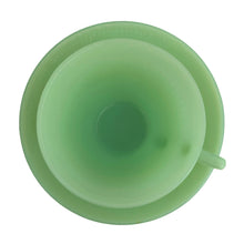 Load image into Gallery viewer, Vintage Fire-King "Jane Ray" pattern pressed glass jadeite cup and saucer featuring a ribbed pattern. Crafted by the Anchor Hocking, USA, 1945 - 1963. Highly collectible and suits a number of decor styles including farmhouse, shabby chic, mid-century modern, and kitsch kitchen. In excellent condition, free from chips/cracks/repairs. Maker's mark present on the bottom of each piece, see photos. Cup measures 3 3/4 x 2 1/4 inches | saucer measures 4 1/8 inches