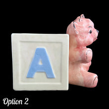 Load image into Gallery viewer, Vintage Kay Finch designed, hand painted ceramic figural pink teddy bear ABC baby block planter. Crafted by Shafford, Japan. Add this adorable planter to your nursery decor. Fill with a little plant or use to store baby care accessories. In as found vintage condition, see photos for details of imperfections. Measures 6 x 3 3/4 x 5 1/2 inches