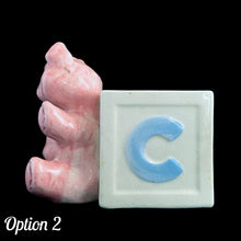 Load image into Gallery viewer, Vintage Kay Finch designed, hand painted ceramic figural pink teddy bear ABC baby block planter. Crafted by Shafford, Japan. Add this adorable planter to your nursery decor. Fill with a little plant or use to store baby care accessories. In as found vintage condition, see photos for details of imperfections. Measures 6 x 3 3/4 x 5 1/2 inches