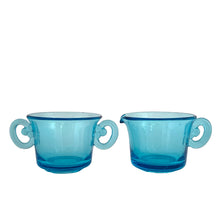 Load image into Gallery viewer, Beautifully designed vintage pressed glass creamer, sugar and tray set in striking laser blue. Crafted by Josef Inwald, Czechoslovakia, circa 1930s. The perfect addition to your tableware! In good vintage condition with two minor flea bites to the inner rim of the tray. The creamer and sugar are free from chips. Trray Measures 9 x 3 1/2 x 1 inches Creamer and sugar measure 3 3/8 x 2 1/2 inches