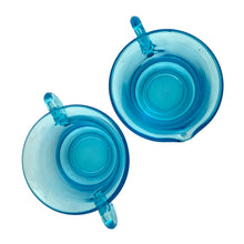 Load image into Gallery viewer, Beautifully designed vintage pressed glass creamer, sugar and tray set in striking laser blue. Crafted by Josef Inwald, Czechoslovakia, circa 1930s. The perfect addition to your tableware! In good vintage condition with two minor flea bites to the inner rim of the tray. The creamer and sugar are free from chips. Trray Measures 9 x 3 1/2 x 1 inches Creamer and sugar measure 3 3/8 x 2 1/2 inches