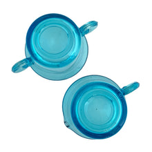 Load image into Gallery viewer, Beautifully designed vintage pressed glass creamer, sugar and tray set in striking laser blue. Crafted by Josef Inwald, Czechoslovakia, circa 1930s. The perfect addition to your tableware! In good vintage condition with two minor flea bites to the inner rim of the tray. The creamer and sugar are free from chips. Trray Measures 9 x 3 1/2 x 1 inches Creamer and sugar measure 3 3/8 x 2 1/2 inches