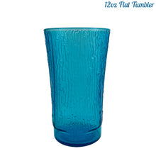 Load image into Gallery viewer, A selection of vintage mid-century modern "Pagoda" glass tumblers in striking laser blue. Crafted by Anchor Hocking, USA, circa 1960s. This glassware features a unique bark-like texture and is the perfect addition to your Tiki or Chinoiserie style drink and barware! All pieces are excellent condition, free from chips. 12oz Flat Tumblers