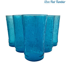 Load image into Gallery viewer, A selection of vintage mid-century modern "Pagoda" glass tumblers in striking laser blue. Crafted by Anchor Hocking, USA, circa 1960s. This glassware features a unique bark-like texture and is the perfect addition to your Tiki or Chinoiserie style drink and barware! All pieces are excellent condition, free from chips. 12oz Flat Tumblers
