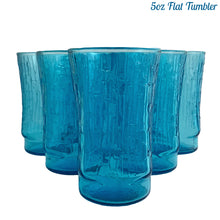 Load image into Gallery viewer, A selection of vintage mid-century modern "Pagoda" glass tumblers in striking laser blue. Crafted by Anchor Hocking, USA, circa 1960s. This glassware features a unique bark-like texture and is the perfect addition to your Tiki or Chinoiserie style drink and barware! All pieces are excellent condition, free from chips. 5oz Flat Tumblers
