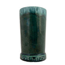 Load image into Gallery viewer, Full view of 1960s Laurentian Pottery Star Weekly cup with iconic green lava glaze, Quebec-made Canadiana