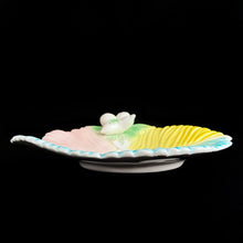 Load image into Gallery viewer, Lovely vintage ceramic leaf shaped dish in pastel colours of pink, yellow, blue and green with white figural fruits. Italy, circa 1960s. Use for your favourite snacks, trinkets or as a catchall. Adds a nice pop of colour to your decor!  In excellent condition with one small flea bite on the rim of the foot. Marked Italy.  Measures 9 1/2 x 7 x 2 inches