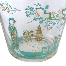 Load image into Gallery viewer, Close-up of Libbey Glass Chinoiserie ice bucket showing geisha figure in turquoise and gold kimono beside a gold pagoda and flowering cherry blossom branches, Canada 1950s–60s
