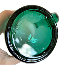 Load image into Gallery viewer, Base view held in hand at angle showing "MADE IN USA" embossed arc