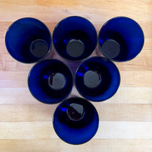 Load image into Gallery viewer, Overhead view of six vintage Libbey Flare cobalt blue tumblers