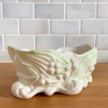 Load image into Gallery viewer, Vintage "Lily of the Valley" Parian porcelain candy dish with embossed blossoms and foliage highlight with green lustre and gold gilt detail. Crafted by Belleek, Ireland, 1980 - 1992 (7th mark). A beautiful collector piece! In excellent condition, free from chips/cracks/repairs. Gold Mark Measures 5 3/4 x 2 3/4 x 2 1/2 inches