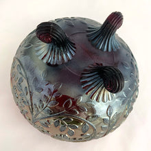 Load image into Gallery viewer, Vintage Louisa amethyst carnival glass tri-footed rose bowl vase features ribbed curled feet and scalloped rim. Crafted by Westmoreland Glass, USA, 1910s. A stunning example of early American pressed glass with magnificent iridescence. An excellent gift for any collector!
In excellent condition, no chips. Unmarked, typical for early Westmoreland Glass.
Measures 4 3/4 x 4 inches