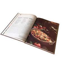 Load image into Gallery viewer, Better Homes and Gardens is known for its fabulous cookbooks. This hardcover cookbook focuses on Low-Cost Cooking recipes. Its 96 pages are filled with amazing recipes along with many colour photographs. Originally published by Meredith Corporation, USA, 1980. This is the first edition, forth printing, 1981.
In great vintage condition.