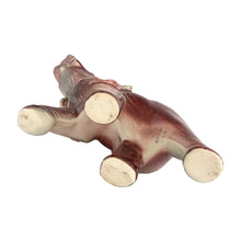 Load image into Gallery viewer, Vintage mid-century era figural lucky elephant ceramic plant in shakes of cranberry, green, yellow and gray. Marked Made in USA. Bring some luck to your gardening with this sweet, trunk up, planter!
In excellent condition, no chips/cracks/repairs.
Measures 9 x 4 x 7 7/8 inches