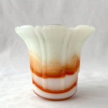 Load image into Gallery viewer, Vintage marbleized uranium slag glass flower pot with ribs and flutes in swirled shades of green, brown and orange. Glows intensely under black light. Produced by Akro Agate, circa 1930s. A lovely piece for small plants. Easily repurpose as a catchall, candy dish or upscale your office and use this as a paperclip holder. In as found vintage condition, there is a small chip at the rim. Marked “Made in U.S.A.” Measures 3 1/2 x 3 inches