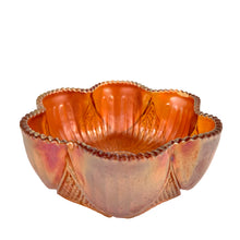 Load image into Gallery viewer, Antique Sowerby marigold carnival glass bowl, angled view showing ribbed interior and hobstar cut triangles exterior pattern with sawtooth rim, England, 1920s