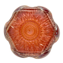 Load image into Gallery viewer, Base of antique Sowerby marigold carnival glass bowl showing intricate starburst and concentric ring pressed glass pattern with scalloped edge, England, 1920s