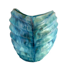 Load image into Gallery viewer, front view of vintage nautilus shell planter showing organic ridged texture and blue glaze
