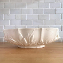 Load image into Gallery viewer, Vintage Art Deco large matte white glazed lotus centrepiece console bowl. Crafted by Nelson McCoy Pottery, 1940s. This rare piece is must for any Nelson McCoy art pottery collector!
In good vintage condition, minor flea bite on the inner edge, no cracks or repairs. Typical manufacturers glaze bubbles. Maker's mark.
Measures 12 x 7 1/2 x 4 inches