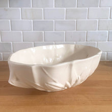 Load image into Gallery viewer, Vintage Art Deco large matte white glazed lotus centrepiece console bowl. Crafted by Nelson McCoy Pottery, 1940s. This rare piece is must for any Nelson McCoy art pottery collector!
In good vintage condition, minor flea bite on the inner edge, no cracks or repairs. Typical manufacturers glaze bubbles. Maker's mark.
Measures 12 x 7 1/2 x 4 inches