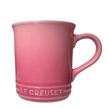 Load image into Gallery viewer, Retired Mauve Pink Le Creuset stoneware 14oz mug with iconic three-ring accent and cream beige interior. Side view