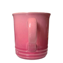 Load image into Gallery viewer, Retired Mauve Pink Le Creuset stoneware 14oz mug with iconic three-ring accent and cream beige interior. Handle view