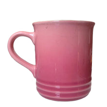 Load image into Gallery viewer, Retired Mauve Pink Le Creuset stoneware 14oz mug with iconic three-ring accent and cream beige interior. Side view