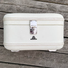Load image into Gallery viewer, Vintage retro style cream or off-white coloured hard shell make-up travel case. with original blue interior, mirror, plastic line bottom, tray and ID tag. Crafted by L. McBrine Company Limited, Canada in Kitchener, Ontario Canada! Circa 1960/70s. This brings back all the feels of travelling in style! In good vintage condition with appropriate age-related wear. No key. Tray has a hairline crack, but still intact and useable. Measures 14 1/4 x 9 1/4 x 8 5/8 inches luggage