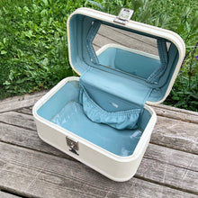 Load image into Gallery viewer, Vintage retro style cream or off-white coloured hard shell make-up travel case. with original blue interior, mirror, plastic line bottom, tray and ID tag. Crafted by L. McBrine Company Limited, Canada in Kitchener, Ontario Canada! Circa 1960/70s. This brings back all the feels of travelling in style! In good vintage condition with appropriate age-related wear. No key. Tray has a hairline crack, but still intact and useable. Measures 14 1/4 x 9 1/4 x 8 5/8 inches luggage