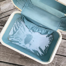 Load image into Gallery viewer, Vintage retro style cream or off-white coloured hard shell make-up travel case. with original blue interior, mirror, plastic line bottom, tray and ID tag. Crafted by L. McBrine Company Limited, Canada in Kitchener, Ontario Canada! Circa 1960/70s. This brings back all the feels of travelling in style! In good vintage condition with appropriate age-related wear. No key. Tray has a hairline crack, but still intact and useable. Measures 14 1/4 x 9 1/4 x 8 5/8 inches luggage