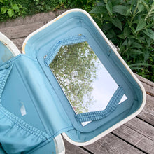 Load image into Gallery viewer, Vintage retro style cream or off-white coloured hard shell make-up travel case. with original blue interior, mirror, plastic line bottom, tray and ID tag. Crafted by L. McBrine Company Limited, Canada in Kitchener, Ontario Canada! Circa 1960/70s. This brings back all the feels of travelling in style! In good vintage condition with appropriate age-related wear. No key. Tray has a hairline crack, but still intact and useable. Measures 14 1/4 x 9 1/4 x 8 5/8 inches luggage