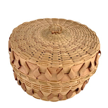 Load image into Gallery viewer, Angled overhead exterior view of the antique Mi'kmaq Wabanaki fancy basket lid showing the radiating black ash splint construction, jikiji'j curl edging, and age-related patina, early 20th century