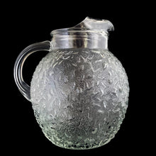 Load image into Gallery viewer, Vintage clear Miliano ice lip glass pitcher features a textured surface and ribbed handle. Crafted by Anchor Hocking, between 1960-1969. A true classic!
In excellent condition, no chips/cracks.
Measures 7 x 8 inches
Capacity 96 ounces