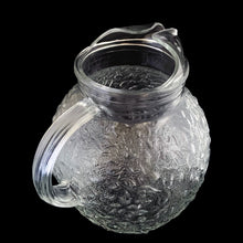 Load image into Gallery viewer, Vintage clear Miliano ice lip glass pitcher features a textured surface and ribbed handle. Crafted by Anchor Hocking, between 1960-1969. A true classic!
In excellent condition, no chips/cracks.
Measures 7 x 8 inches
Capacity 96 ounces