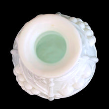 Load image into Gallery viewer, Vintage milk glass genie bottle featuring an embossed pattern of cherries and grapevines. Produced by glass artisans in the Empoli region of Italy. This superb mid-century piece of art glass would make a unique addition to your home decor collection. Perfect as a decanter, vase or decor piece. Dates between 1950 to 1970. These bottles are incredibly fabulous and highly collectible.
In excellent vintage condition, no chips. Unmarked. No stopper.
Measures 4 x 10 1/2 inches
