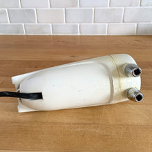 Load image into Gallery viewer, Fabulous vintage white and black Sunbeam Mixmaster Junior hand mixer, Model J. Crafted by the Sunbeam Corporation, USA, circa 1950. The power and quality craftsmanship of these mixers is unmatched and are made to last a lifetime. A must-have for any baker or appliance collector!
Tested. In good working order.
Mixer measures 7 1/4 x 3 x 6 inches (10 3/4 inches tall with beaters)