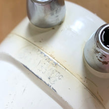 Load image into Gallery viewer, Fabulous vintage white and black Sunbeam Mixmaster Junior hand mixer, Model J. Crafted by the Sunbeam Corporation, USA, circa 1950. The power and quality craftsmanship of these mixers is unmatched and are made to last a lifetime. A must-have for any baker or appliance collector!
Tested. In good working order.
Mixer measures 7 1/4 x 3 x 6 inches (10 3/4 inches tall with beaters)