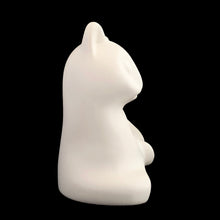 Load image into Gallery viewer, A striking example of vintage MCM craftsmanship, this matte cream art pottery cat embodies the minimalist aesthetic that defined 1960s modernism with its geometric lines and understated elegance. Crafted by the acclaimed Laurentian Pottery studio in Québec, Canada. Its sculptural form and subtle finish have earned it recognition among serious collectors of MCM design and Canadian ceramics, making it a coveted addition to curated collections.
Excellent condition, no chips/cracks/repairs. Original sticker.