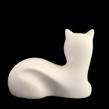 Load image into Gallery viewer, A striking example of vintage MCM craftsmanship, this matte cream art pottery cat embodies the minimalist aesthetic that defined 1960s modernism with its geometric lines and understated elegance. Crafted by the acclaimed Laurentian Pottery studio in Québec, Canada. Its sculptural form and subtle finish have earned it recognition among serious collectors of MCM design and Canadian ceramics, making it a coveted addition to curated collections.
Excellent condition, no chips/cracks/repairs. Original sticker.