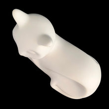Load image into Gallery viewer, A striking example of vintage MCM craftsmanship, this matte cream art pottery cat embodies the minimalist aesthetic that defined 1960s modernism with its geometric lines and understated elegance. Crafted by the acclaimed Laurentian Pottery studio in Québec, Canada. Its sculptural form and subtle finish have earned it recognition among serious collectors of MCM design and Canadian ceramics, making it a coveted addition to curated collections.
Measures 8 1/4 x 4 3/4 x 6 1/4 inches
