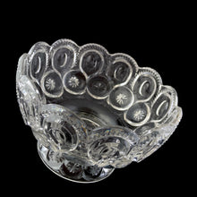 Load image into Gallery viewer, Vintage Moon and Star clear glass footed open compote or bowl with scalloped rim. Crafted by LE Smith Glass, USA, 1940 - 2004. This highly collectible vessel make a lovely candy bowl or catchall to accent your decor.
In excellent condition, no chips.
Measures 7 3/8 x 4 3/4 inches