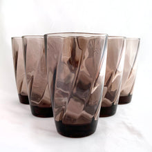 Load image into Gallery viewer, A lovely set of six "Moroccan Amethyst Swirl" glass tumblers. Crafted by the Hazel-Atlas Glass Company, USA, circa 1940-1960s. These glasses feature an optic swirl pattern and are perfect for everyday or any occasion...cheers! In excellent condition, free from chips, minimal wear. Measures 3 3/8 x 5 inches Capacity 12 ounces