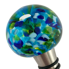Load image into Gallery viewer, Detail of encased flower inside Murano art glass ball wine stopper showing Italian glassblowing craftsmanship