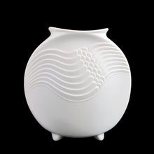 Load image into Gallery viewer, A delicate and elegant art nouveau style white bisque flower vase featuring embossed ocean wave design and glazed on the inside. Impressed "M. Frey" signature and shape number "678". Crafted by Kaiser, Germany. A lovely vase to fill with a sweet bouquet of fresh or dried flowers In excellent condition, free from chips/cracks/repairs. Measures 4 x 4 inches
