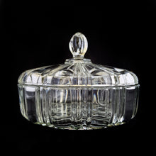 Load image into Gallery viewer, Vintage depression era Old Cafe clear glass lidded candy dish. Crafted by Anchor Hocking, USA, 1936 - 1940. Use this sculpted dish to store candies and nuts. Could be used as a dresser box on a vanity or night stand to store a cell phone and jewellery. Such a versatile piece to add sparkle to your home decor!
In excellent condition, no chips.
Measures 6 7/8 x 5 inches